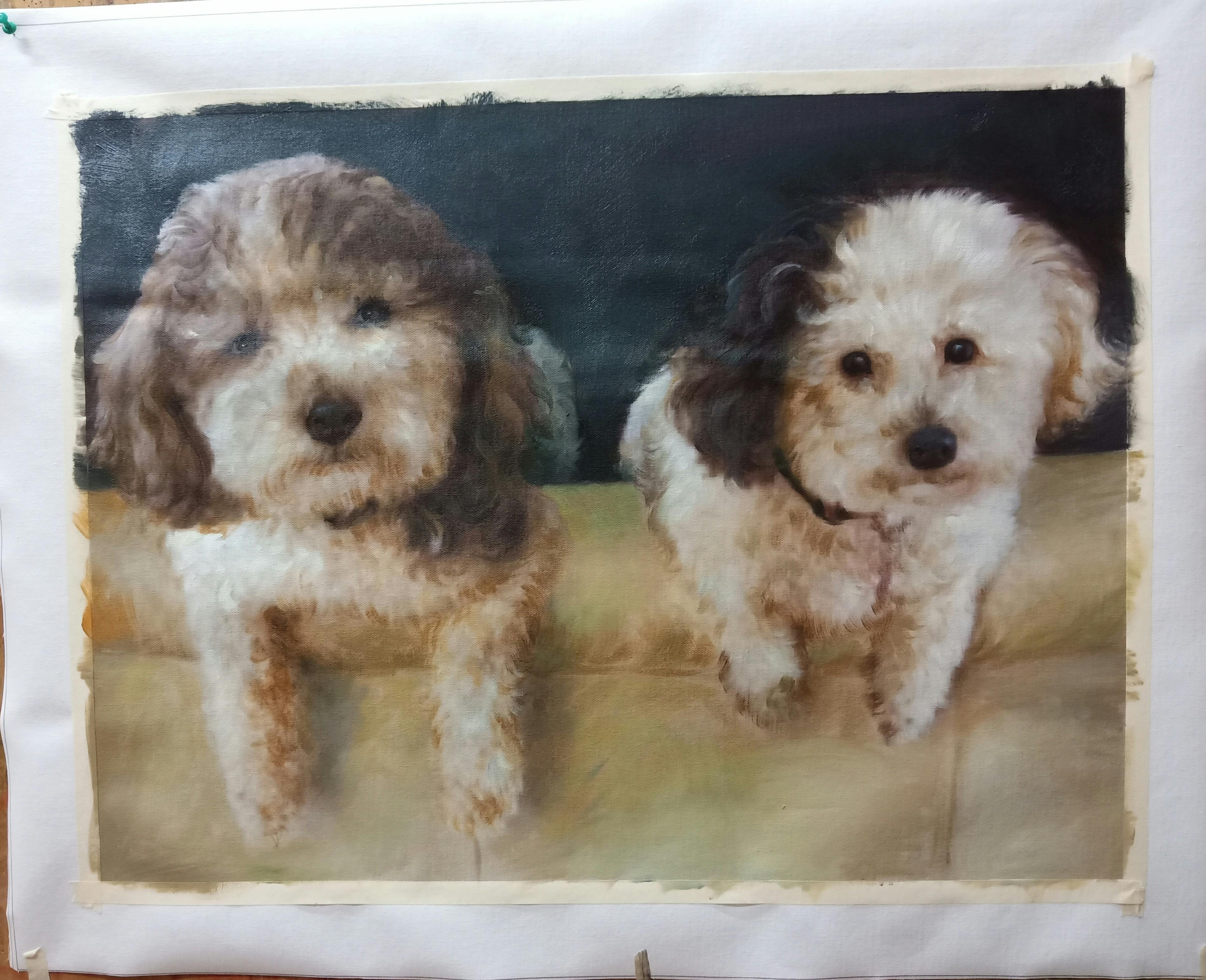 Painting of 2 puppies hanging over the couch with a black background